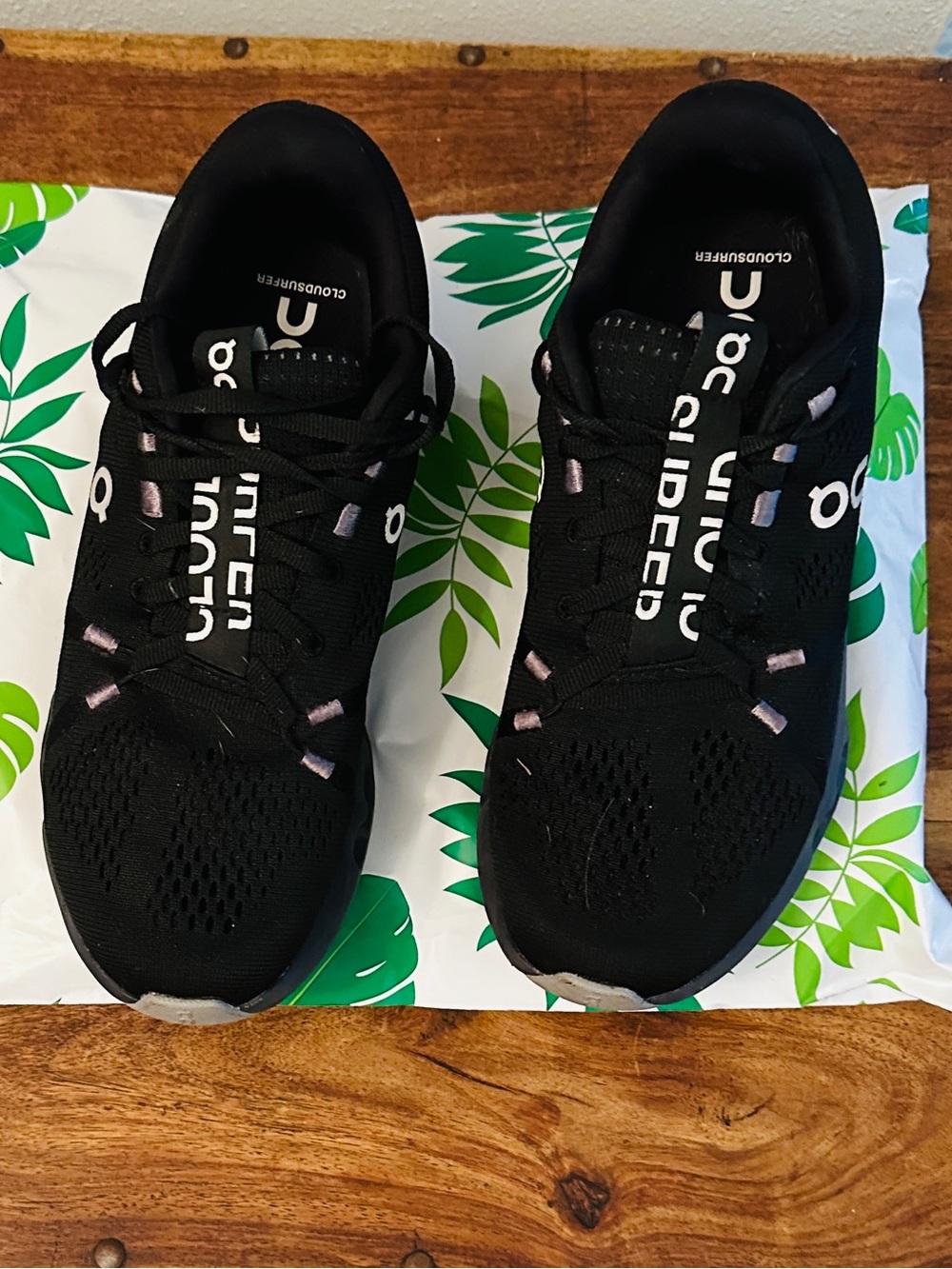 On Running Cloud Women's Black with Subtle Pink Accents Running Shoes